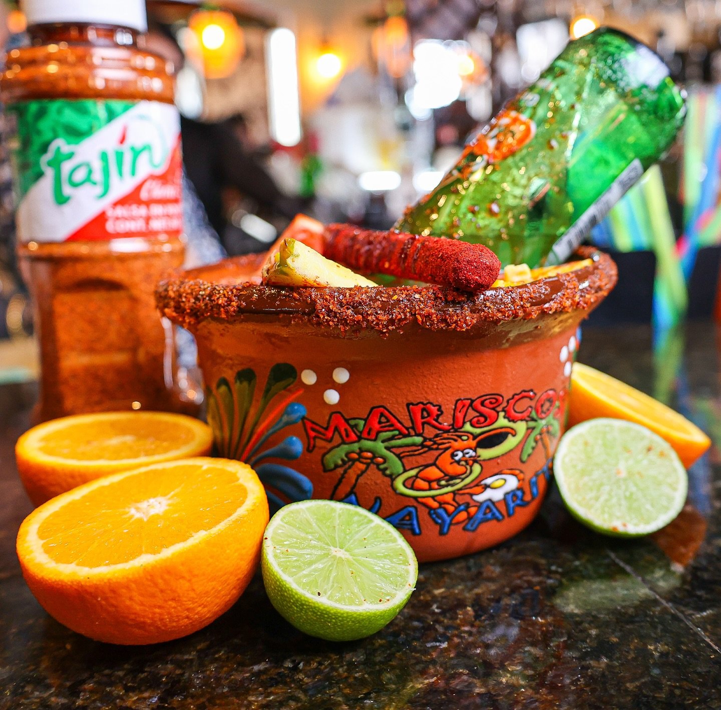 Michelada in a Mariscos Nayarit clay bowl